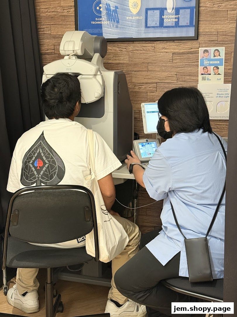 Customer undergoes an eye examination with advanced technology at Zoff.