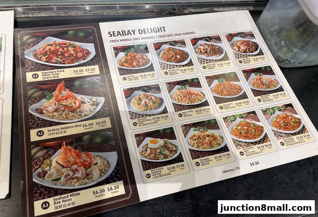 A menu featuring various noodle and rice dishes with appetizing images and prices.