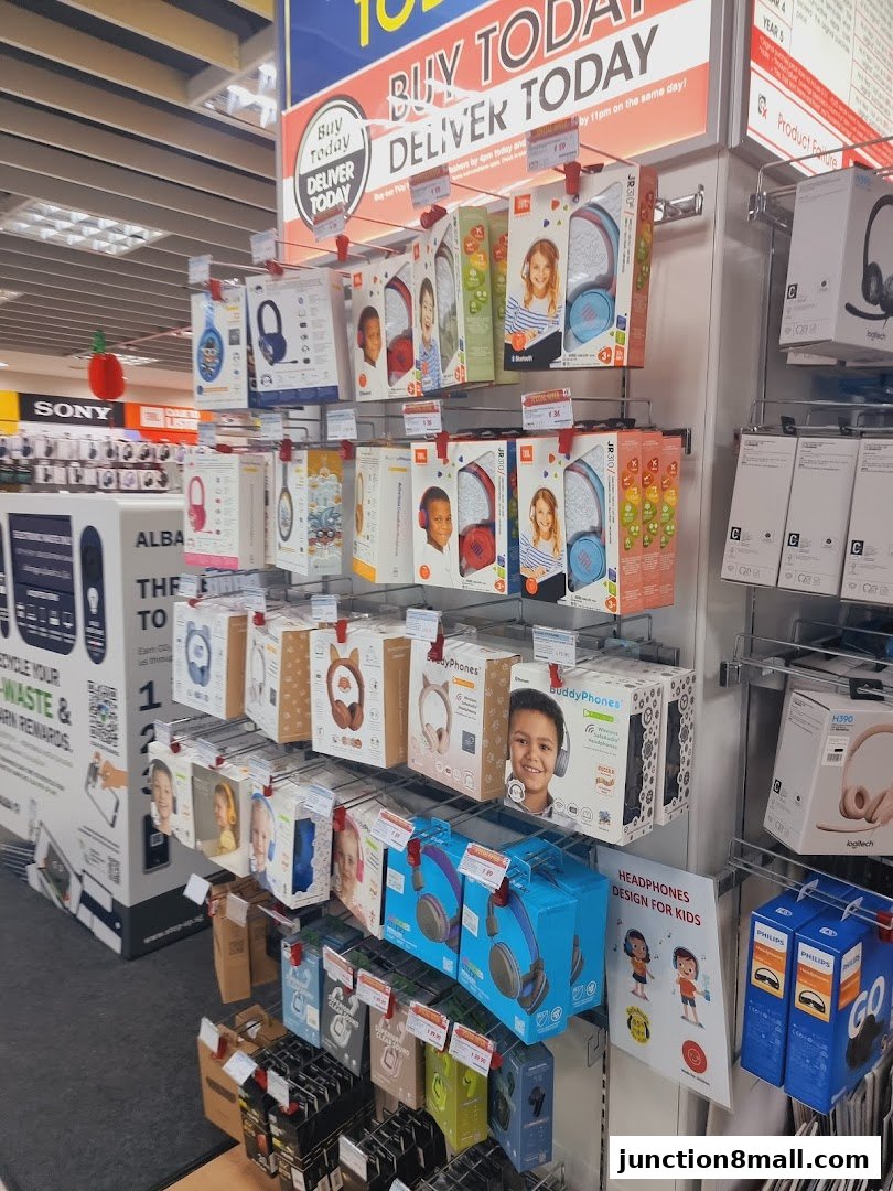 A display of various headphones, including children's models, in a retail store.