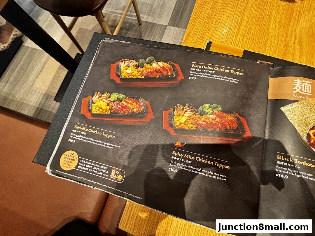 A menu from Aburi-EN featuring various chicken teppan dishes and noodles.