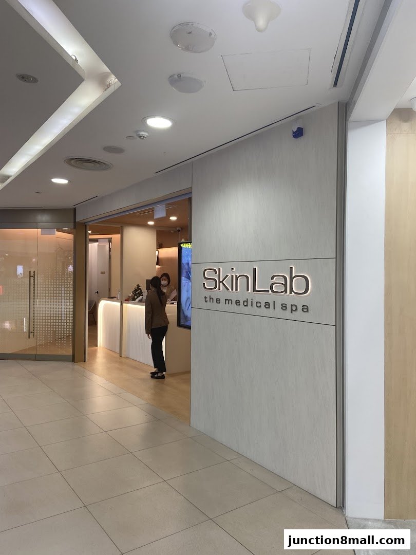 The entrance to SkinLab, a medical spa, with a reception area visible inside.