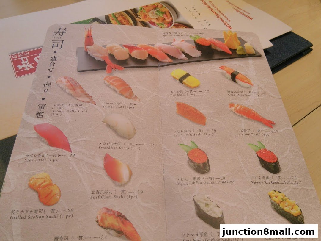 A menu from Watami Japanese Dining featuring various sushi items with prices.