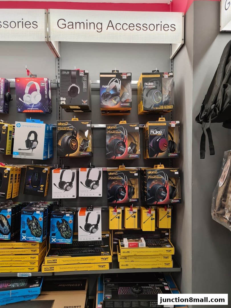 A display wall showcasing various gaming headsets, mice, and keyboards from different brands.