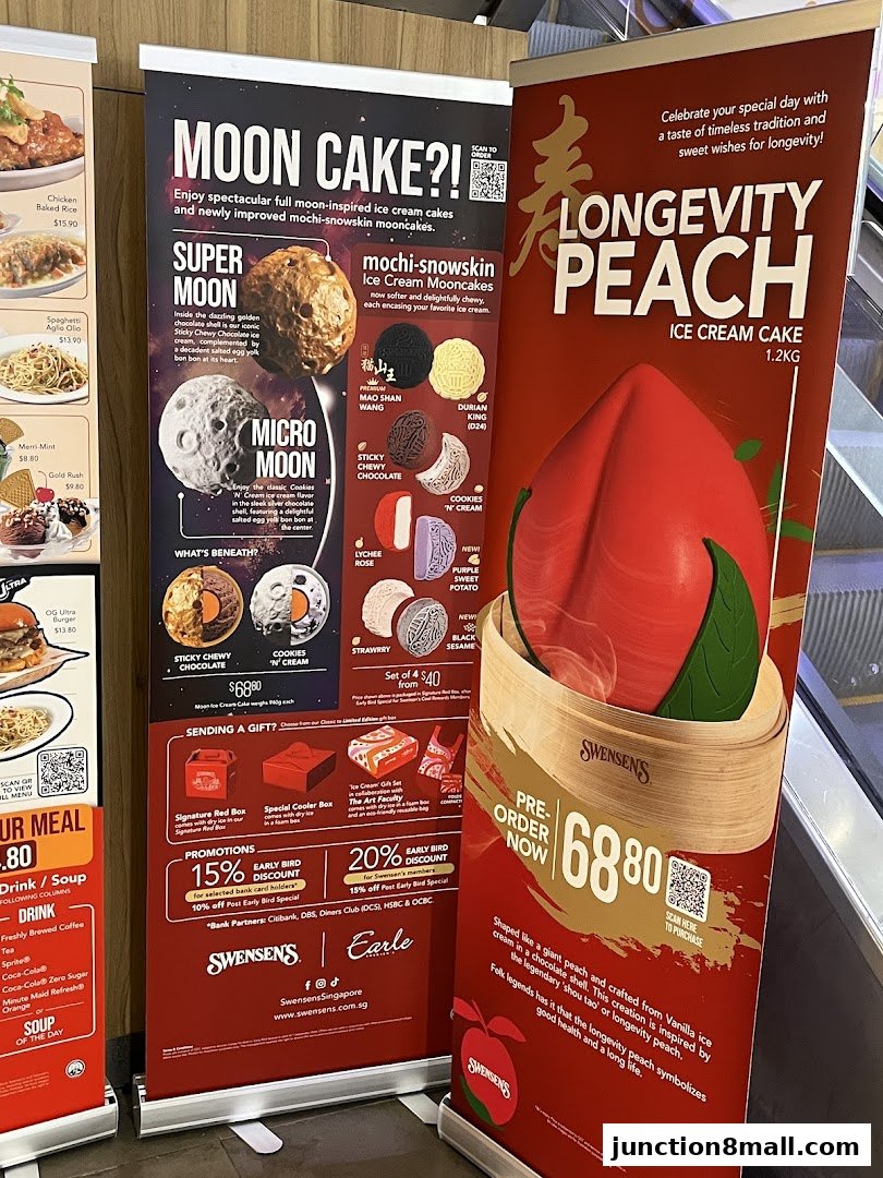 Promotional banners for Swensen's ice cream cakes, featuring mooncakes and a longevity peach cake.