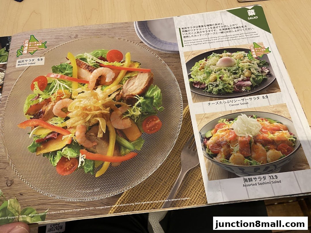 A menu page showcasing three different salads from Watami Japanese Dining.