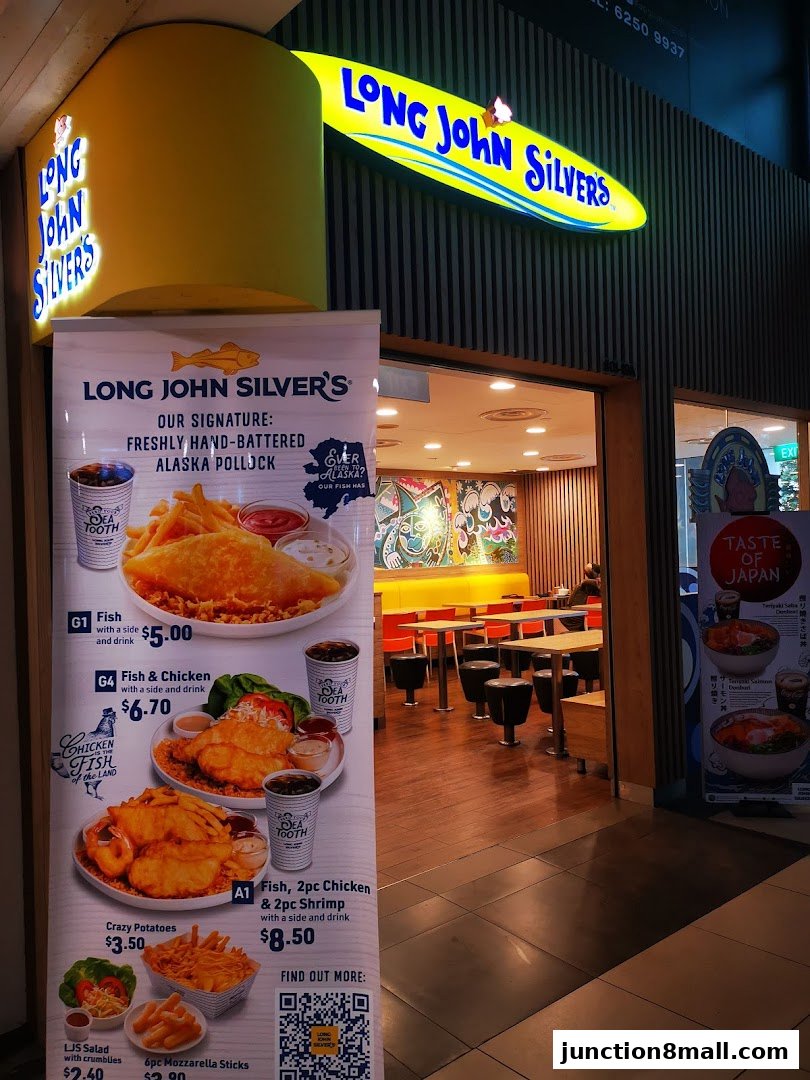 The exterior of a Long John Silver's restaurant with a prominent menu board showcasing food items.