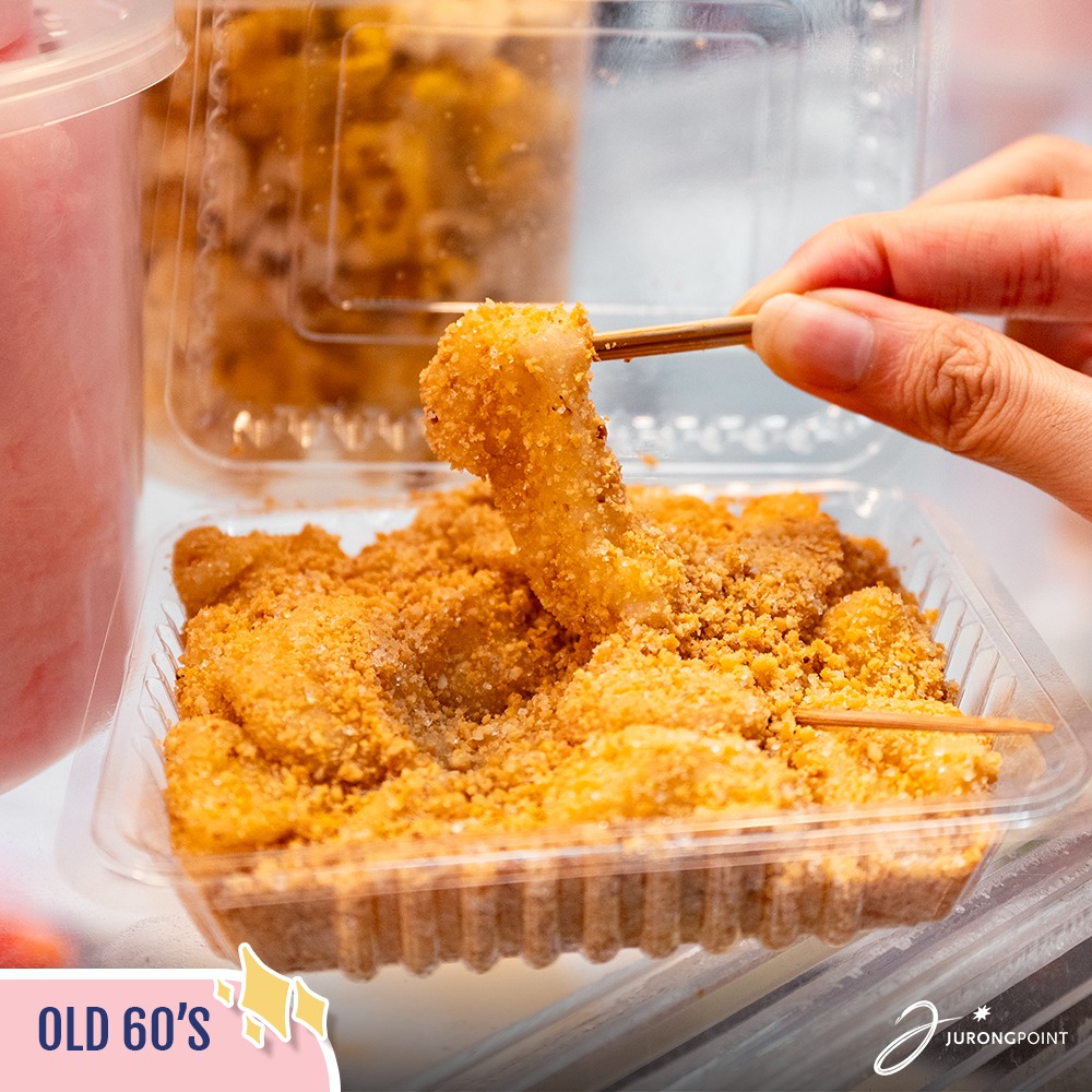 Close-up of a popular Singaporean street food item, ready to be enjoyed.