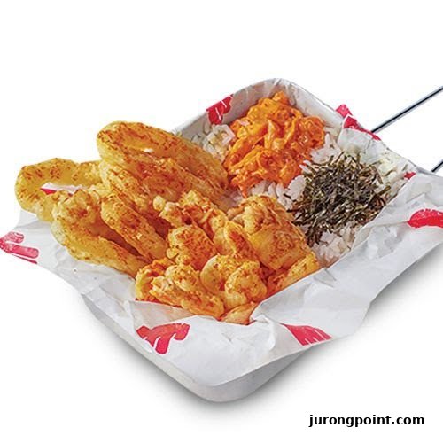 Crispy fried chicken and seafood with rice, seaweed, and sauce served in a tray.