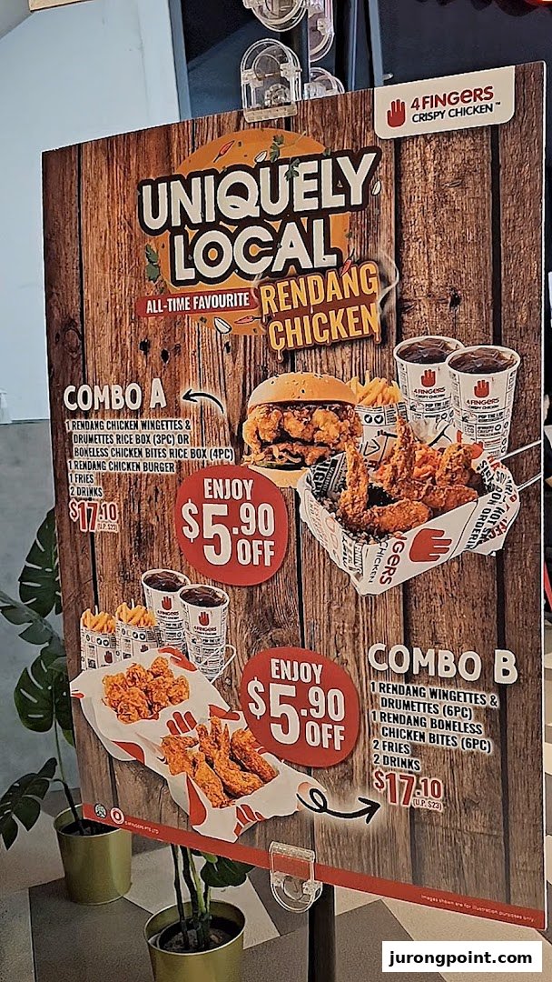 A promotional poster for 4Fingers Crispy Chicken featuring Rendang Chicken combos and special offers.