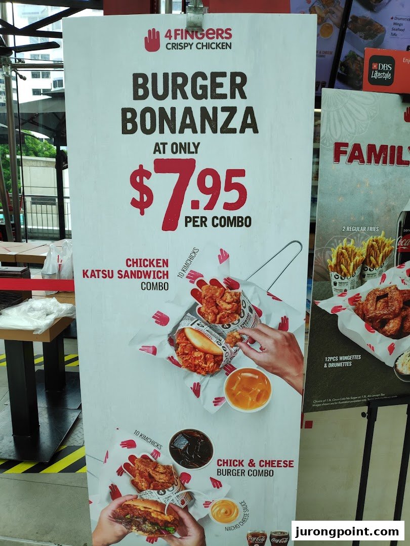 A promotional standee for 4Fingers Crispy Chicken's 'Burger Bonanza' featuring combos for $7.95.