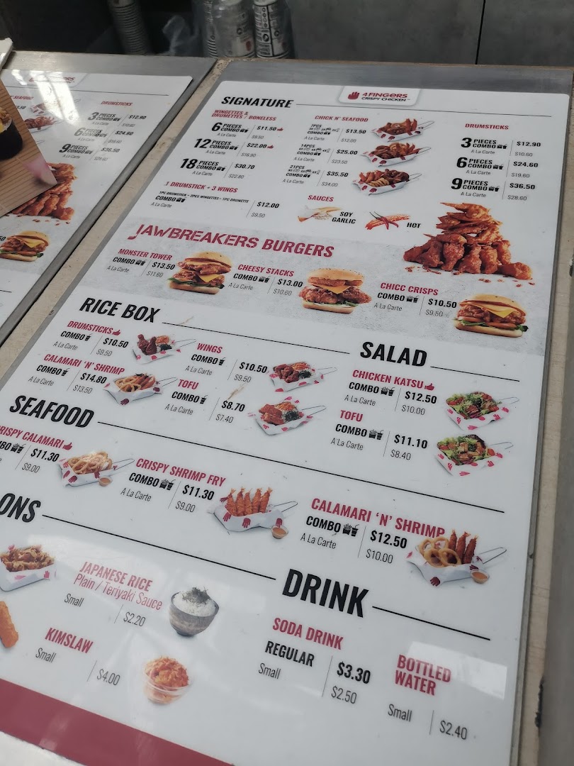 A detailed menu board for 4Fingers Crispy Chicken, showcasing various chicken, burger, seafood, and drink options.