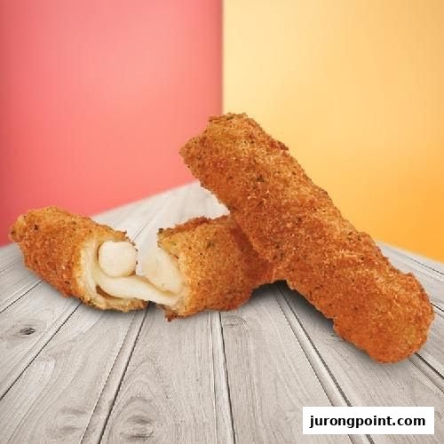 Two crispy mozzarella sticks, one broken open to reveal melted cheese, on a wooden surface.