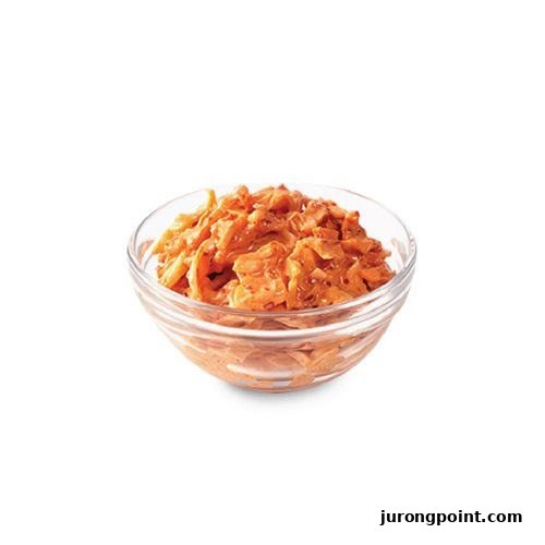 A clear glass bowl filled with orange-colored coleslaw or a similar shredded vegetable side dish.