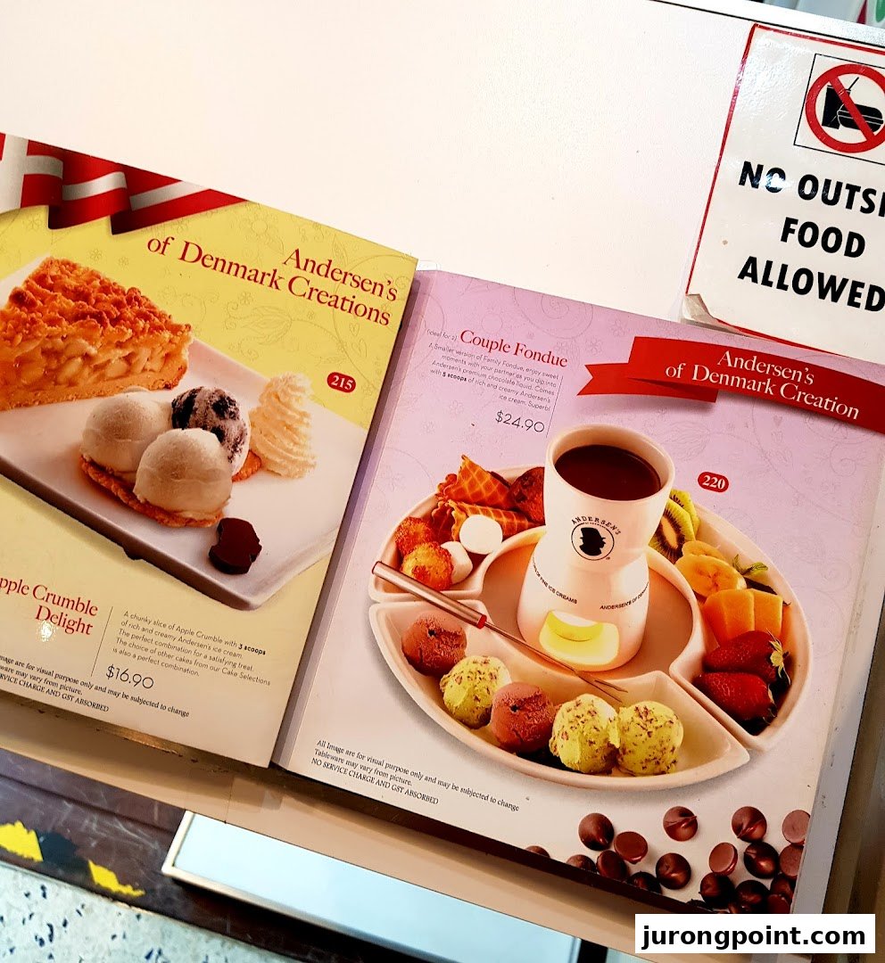 A close-up of Andersen's of Denmark's menu, showcasing delicious dessert options like apple crumble and chocolate fondue.