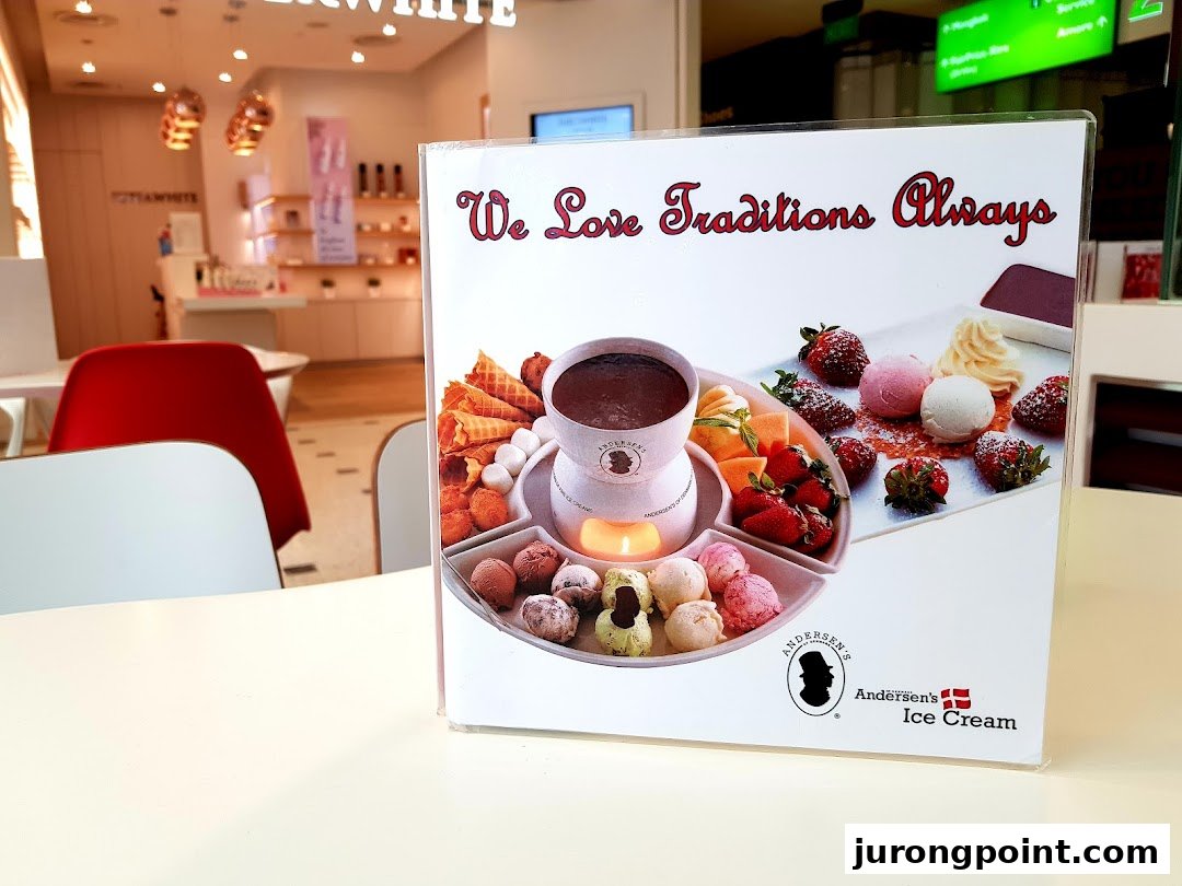A table display featuring a chocolate fondue and ice cream advertisement from Andersen's Ice Cream.