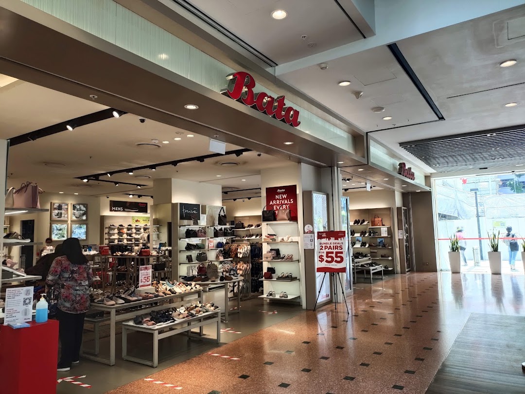 The entrance of a Bata shoe store showcasing a wide range of footwear and accessories.