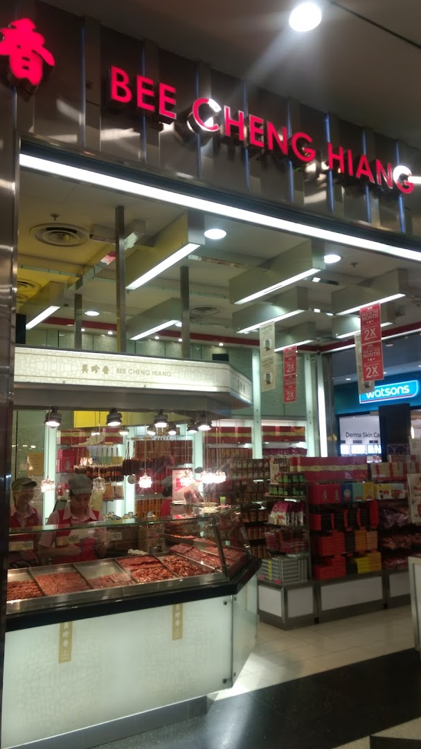 A vibrant view of Bee Cheng Hiang's shop front, showcasing their famous bak kwa and inviting interior.