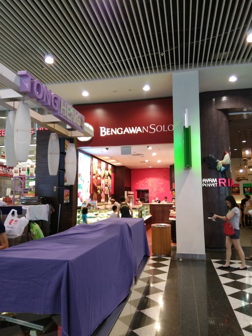 The inviting entrance of Bengawan Solo, showcasing its traditional Indonesian cakes and kueh within a bustling mall.