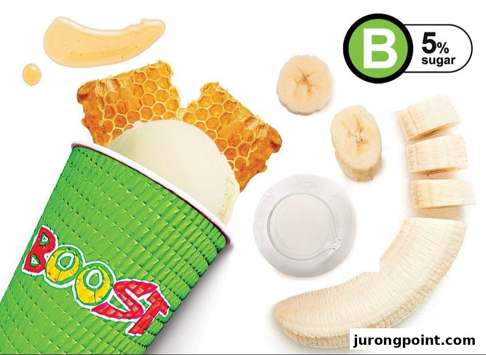 A Boost Juice cup with smoothie, honey, honeycomb, and banana, highlighting 5% sugar content.