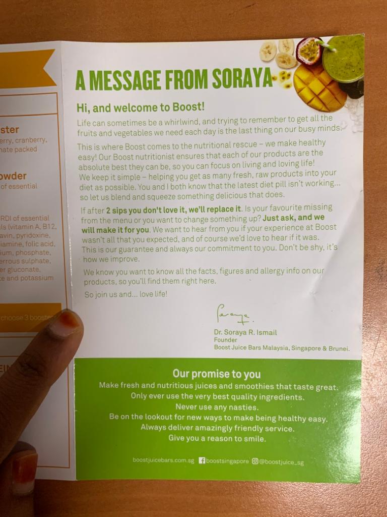A Boost Juice brochure featuring a message from the founder and the brand's promise to customers.