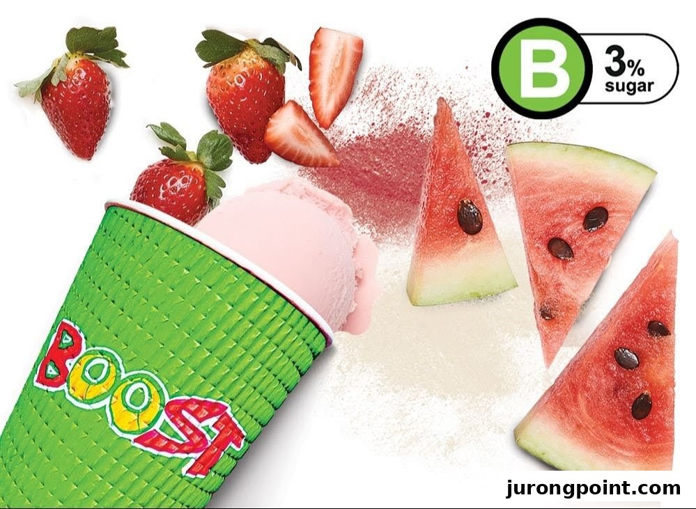 A vibrant image showcasing a Boost Juice cup with strawberries, watermelon, and a pink smoothie, highlighting fresh ingredients.