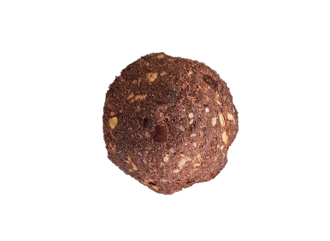 A close-up of a delicious chocolate and nut energy ball from Boost Juice on a white background.