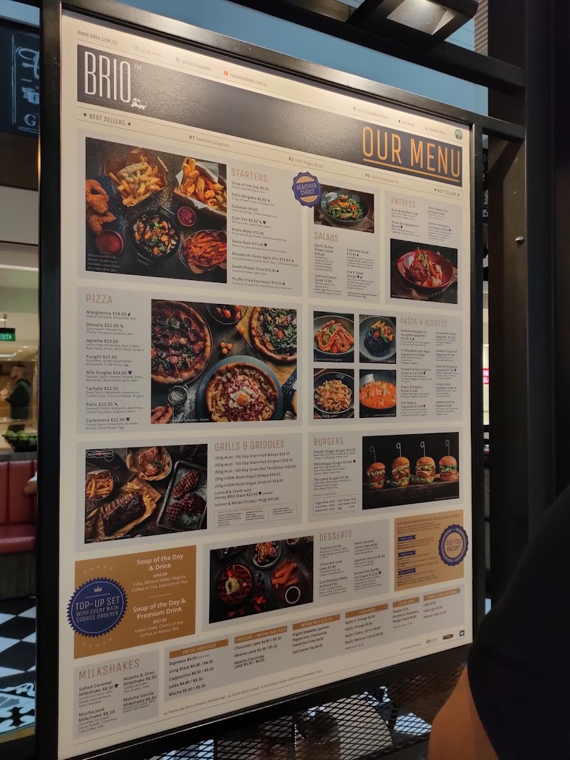 A detailed menu board for Brio restaurant, showcasing a variety of Italian and Western dishes.