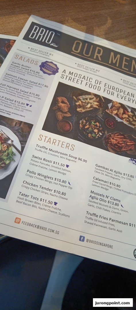 A close-up view of Brio's menu, showcasing salads and starters with prices and descriptions.