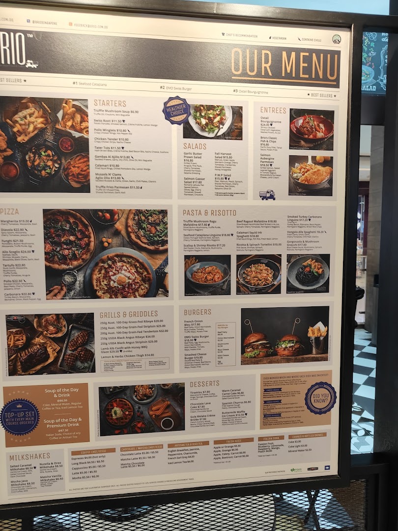 A brightly lit display board showcasing Brio's extensive food and drink menu with various categories.