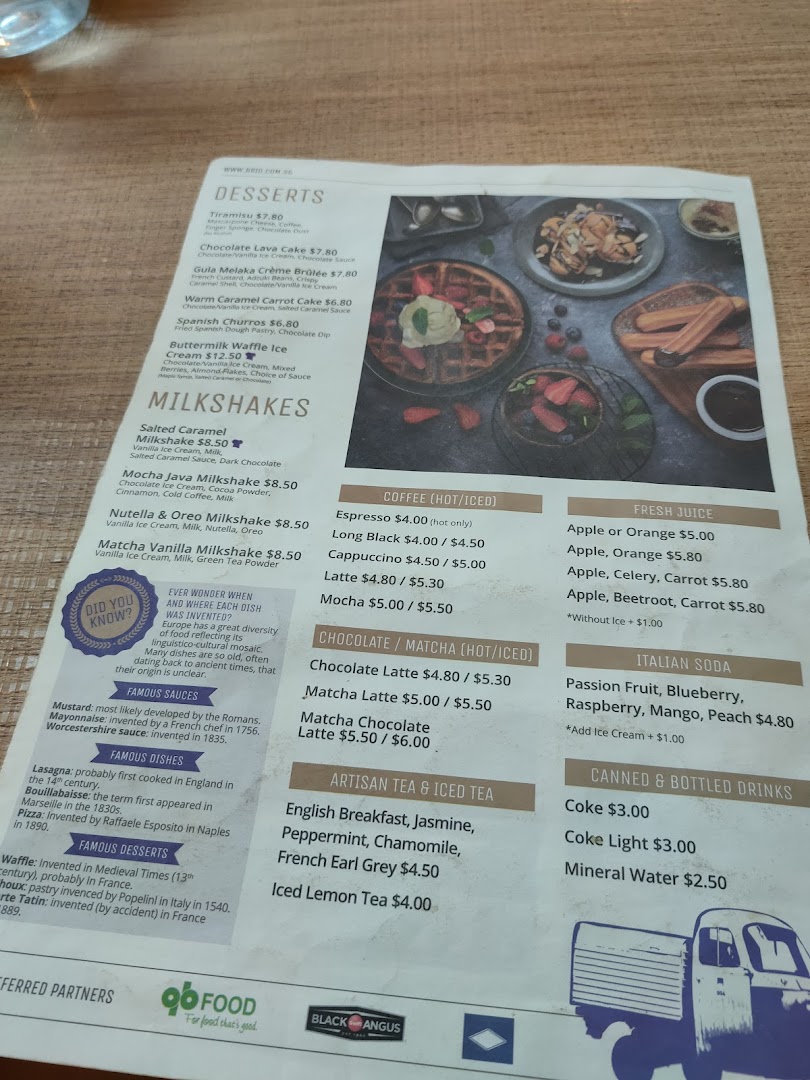 A detailed menu from Brio, showcasing desserts, milkshakes, coffees, teas, juices, and sodas.