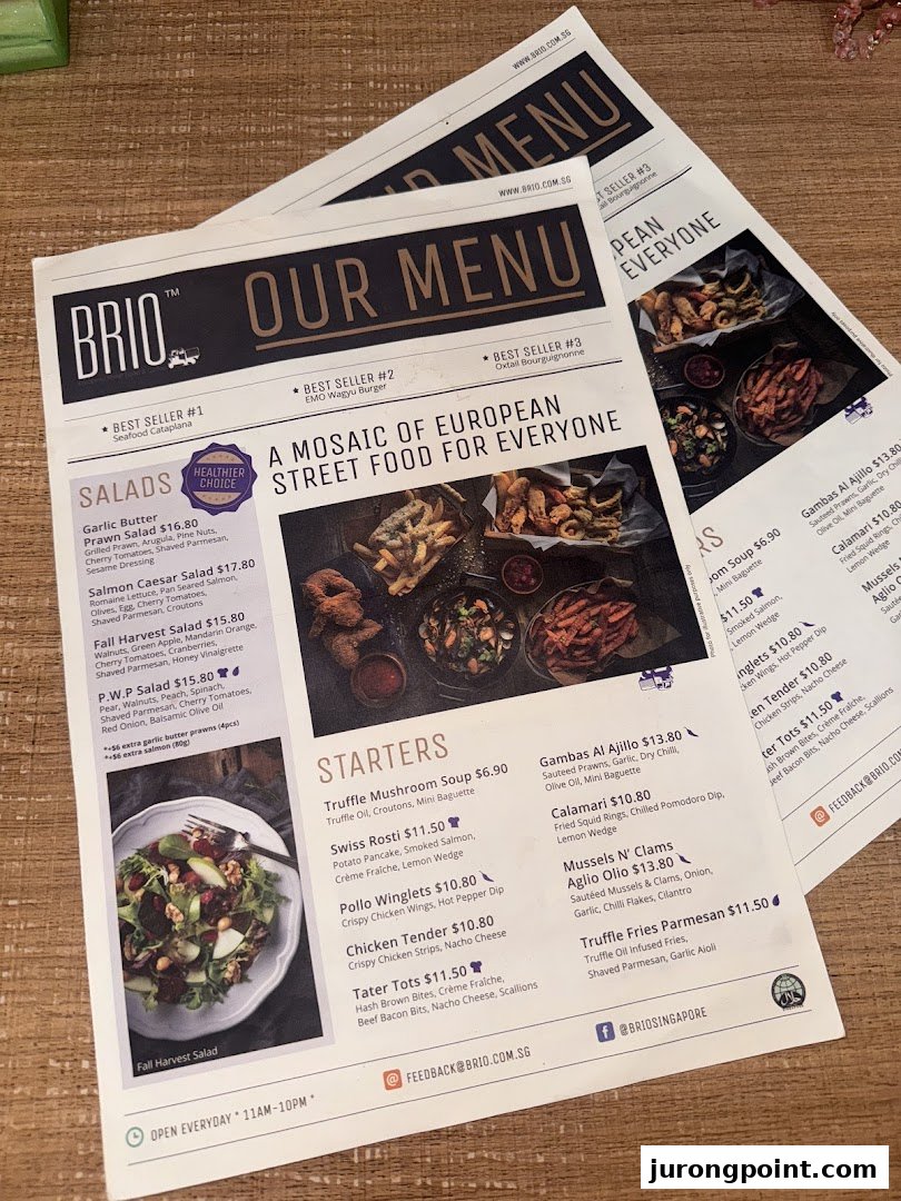 A detailed menu from Brio showcasing European street food, including salads and starters.