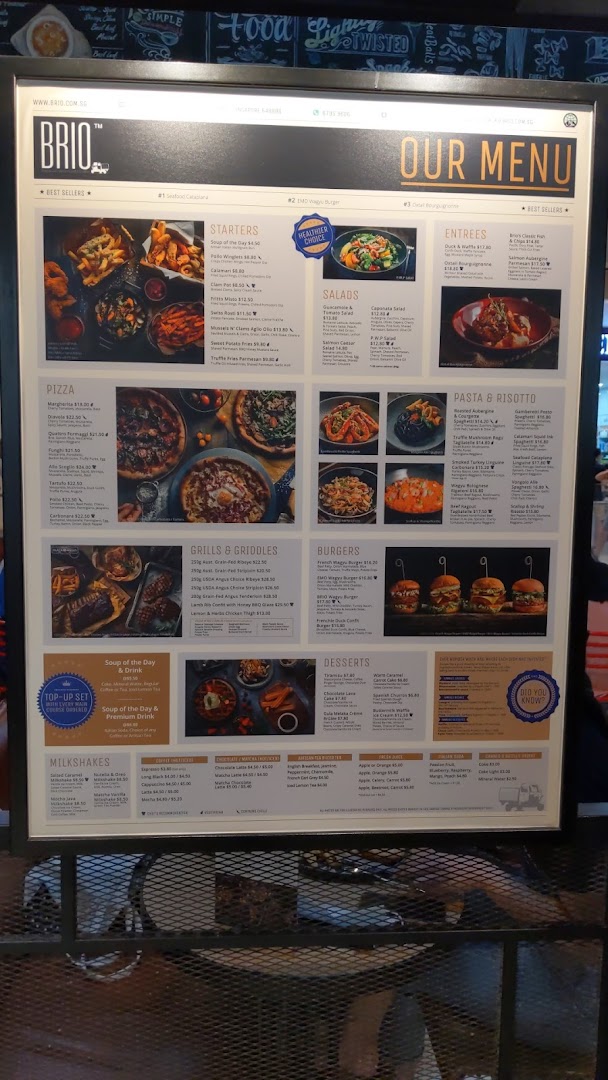 A brightly lit digital menu board for Brio, showcasing a variety of Italian-inspired dishes and drinks.