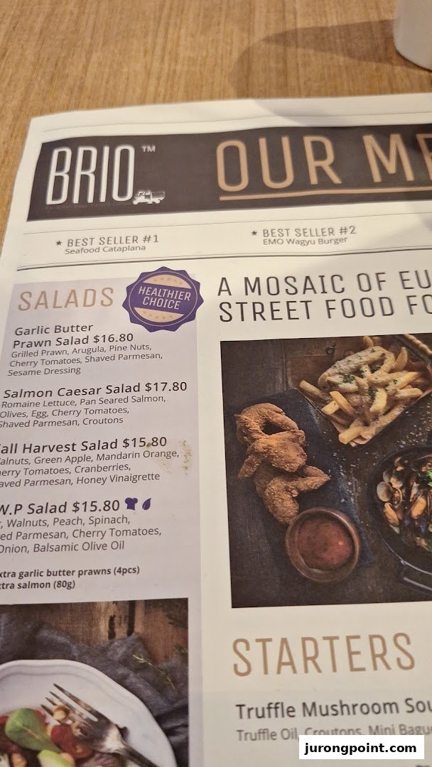 A close-up of Brio's menu, featuring salads, best sellers, and starters.