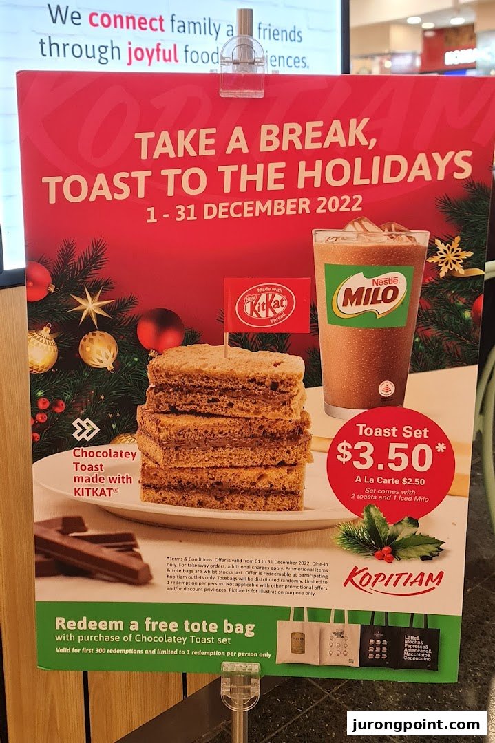 A promotional poster for Kopitiam's holiday 'Toast Set' featuring KitKat toast and Milo.