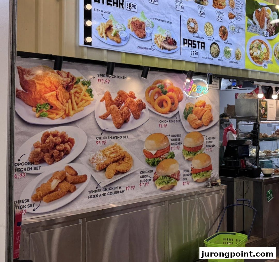 A large menu board displaying a variety of fried chicken, burger, pasta, and other main dishes with prices.