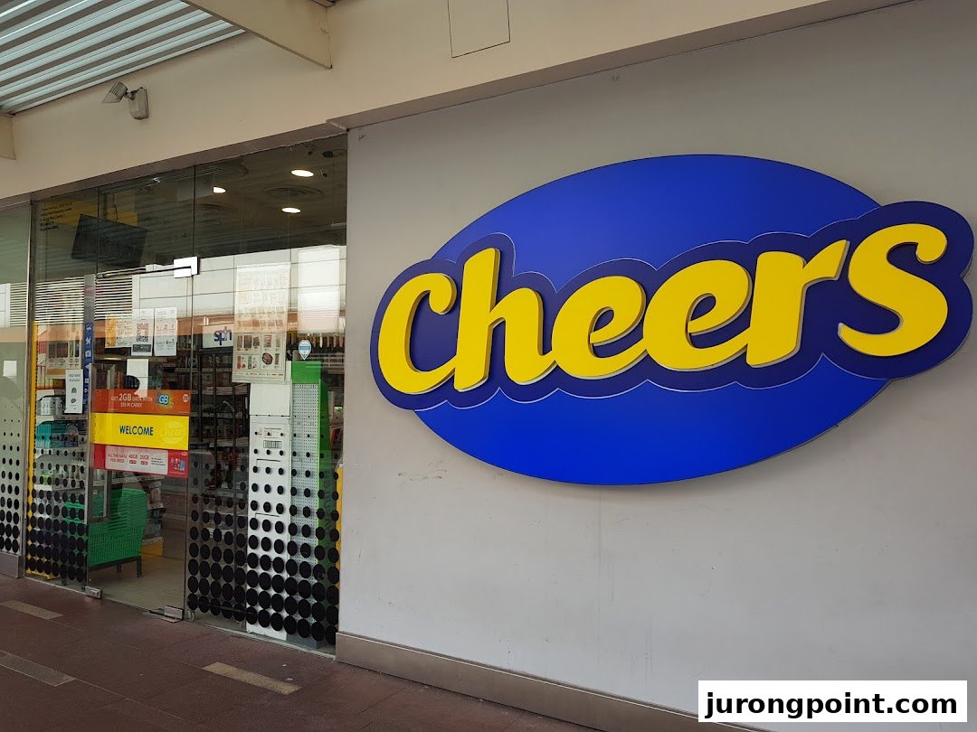 Exterior view of Cheers convenience store entrance with its distinctive blue and yellow logo.