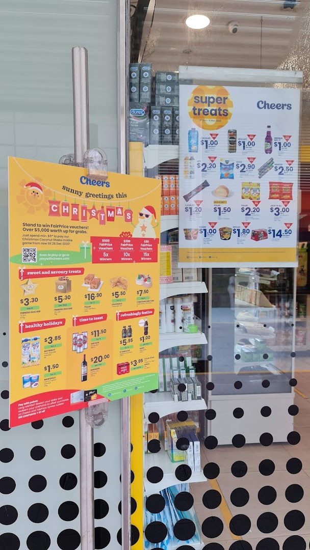 Promotional posters for Cheers convenience store, featuring Christmas offers and 'Super Treats' with various products and prices.