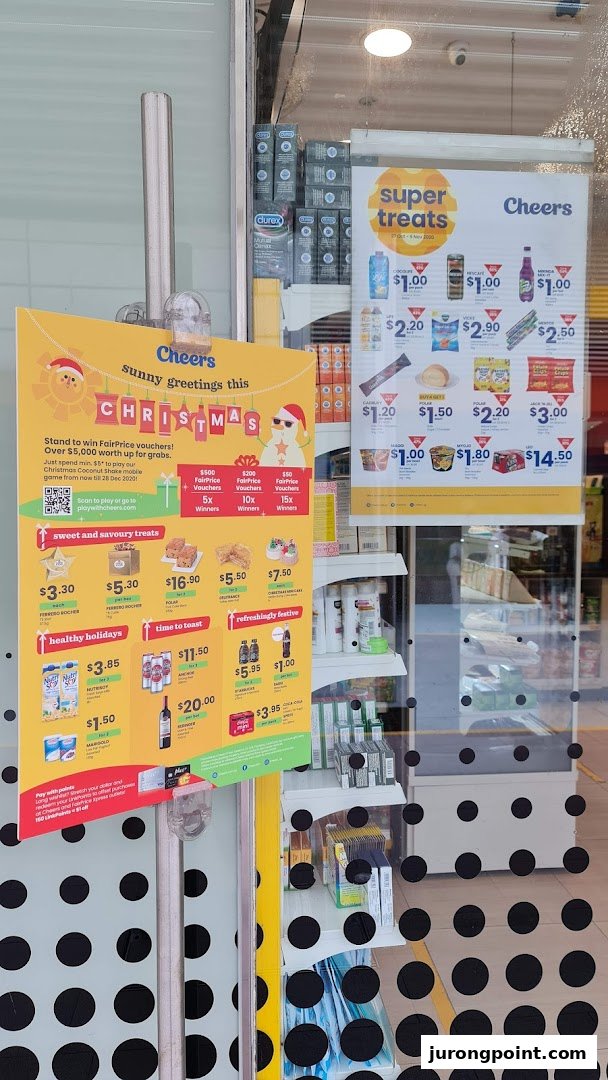 Promotional posters for Cheers convenience store, featuring Christmas offers and 'Super Treats' with various products and prices.