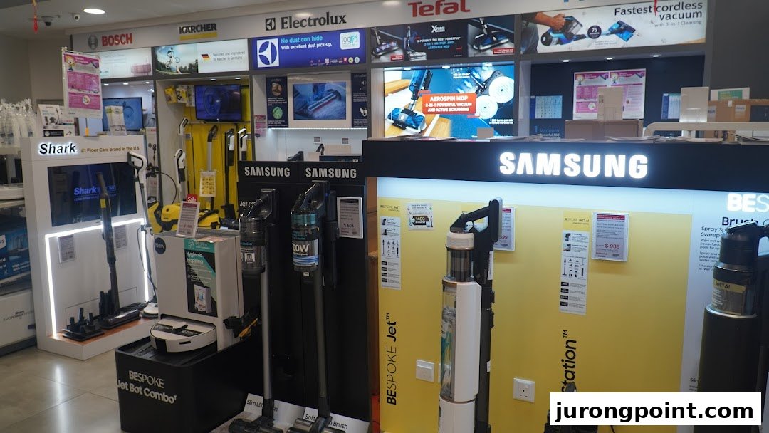 An interior shot of COURTS showcasing a wide range of vacuum cleaners and home cleaning appliances.