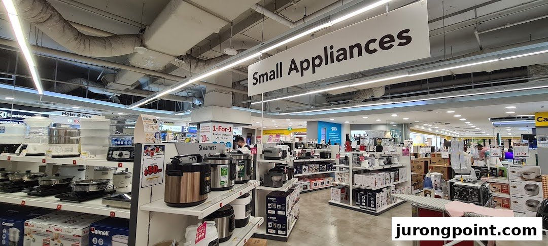 An interior view of COURTS, showcasing a wide array of small kitchen and home appliances on display.