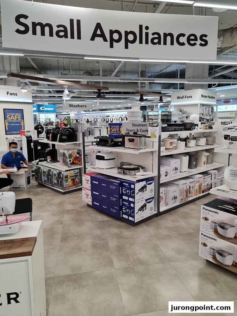 Interior view of COURTS' small appliances section, showcasing various kitchen and home electronics.