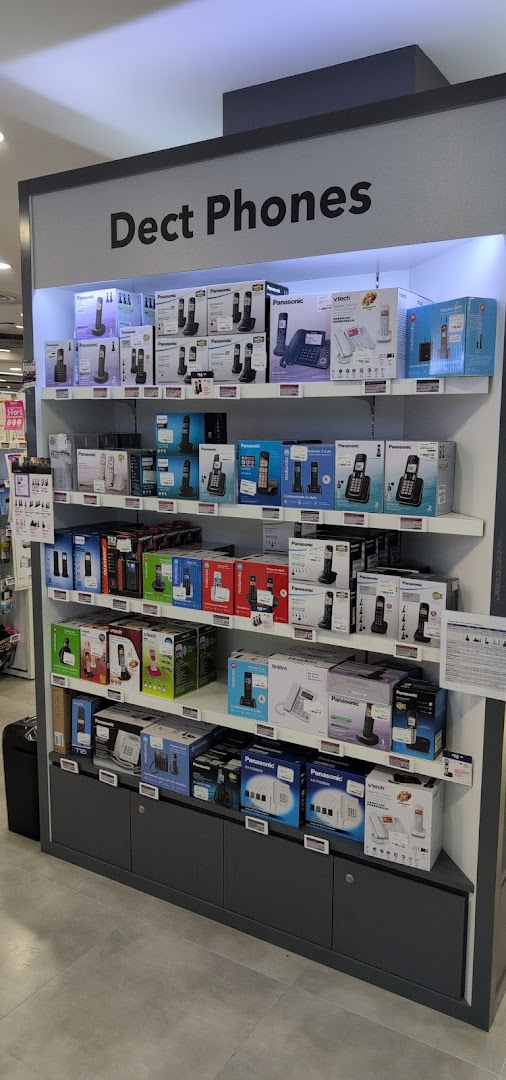 A retail display shelf showcasing a wide selection of Dect Phones from various brands.
