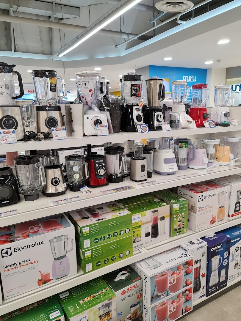 Shelves display a wide range of blenders and small kitchen appliances at COURTS, showcasing various brands and models.