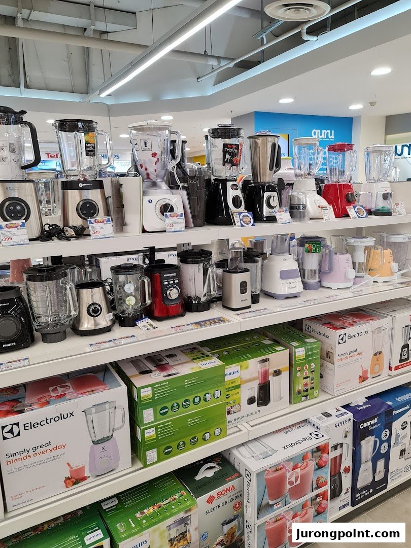 Shelves display a wide range of blenders and small kitchen appliances at COURTS, showcasing various brands and models.