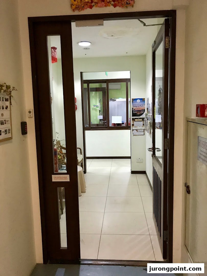 The open entrance to Dementia Singapore - New Horizon Centre, revealing a welcoming interior.