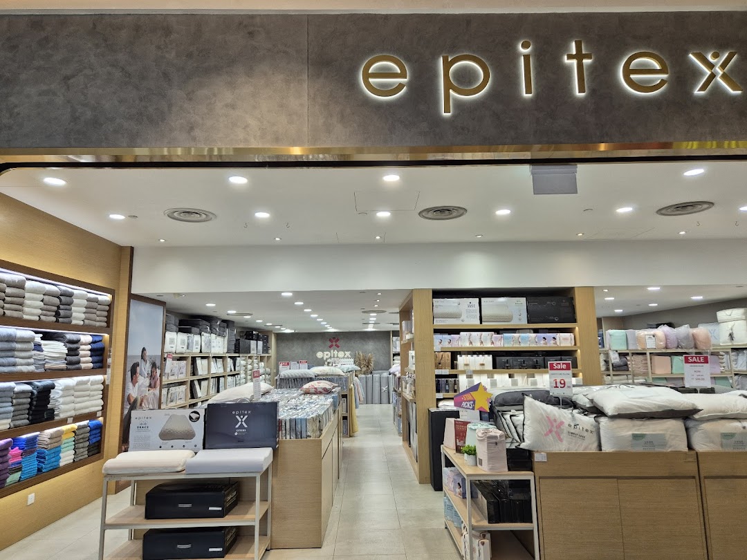 The inviting entrance of Epitex, showcasing a wide array of bedding, bath, and home textile products.