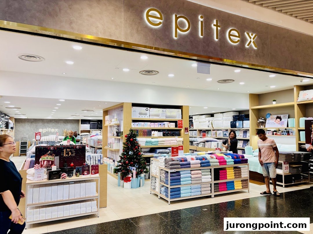 The inviting shop front of Epitex, a home linen store, showcasing a wide array of bedding and bath essentials.