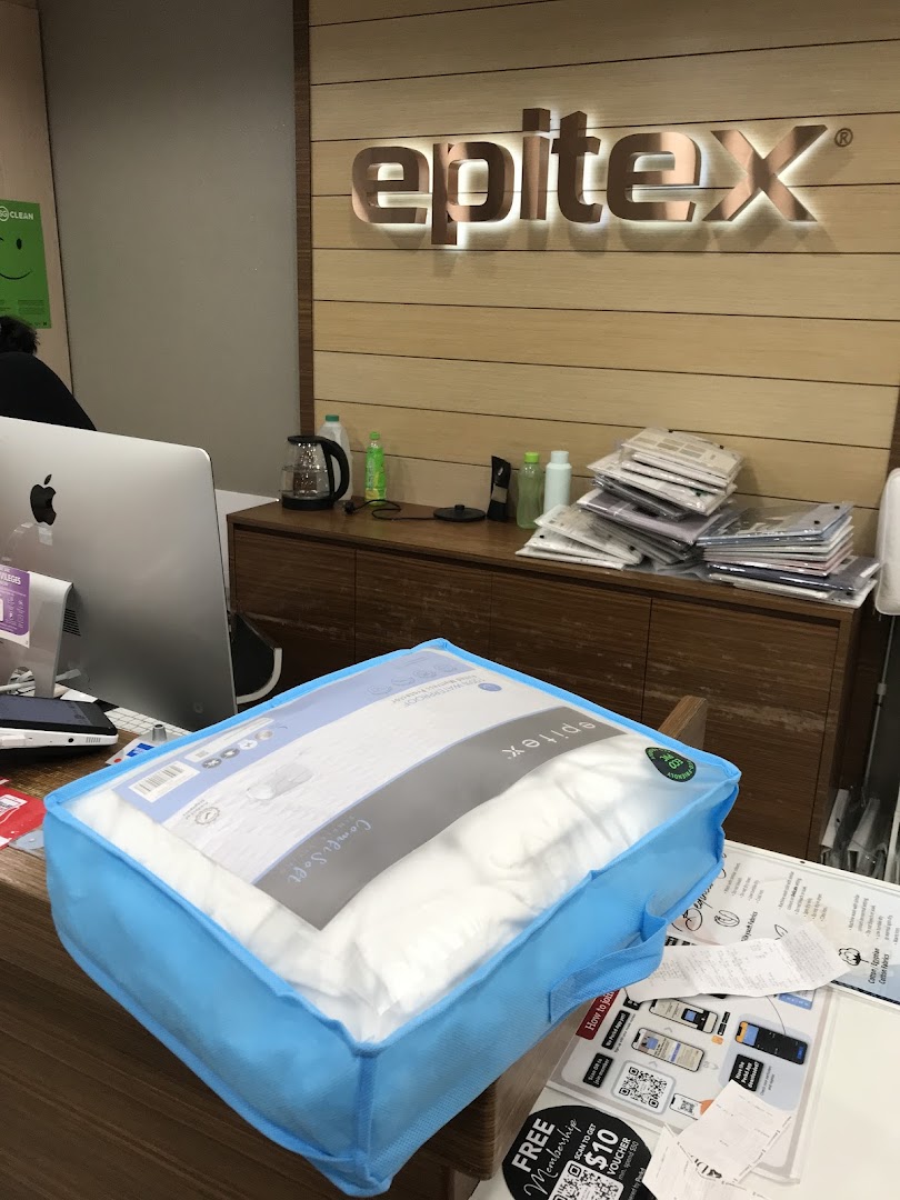 Interior view of Epitex shop counter featuring a packaged bedding product and the brand logo.