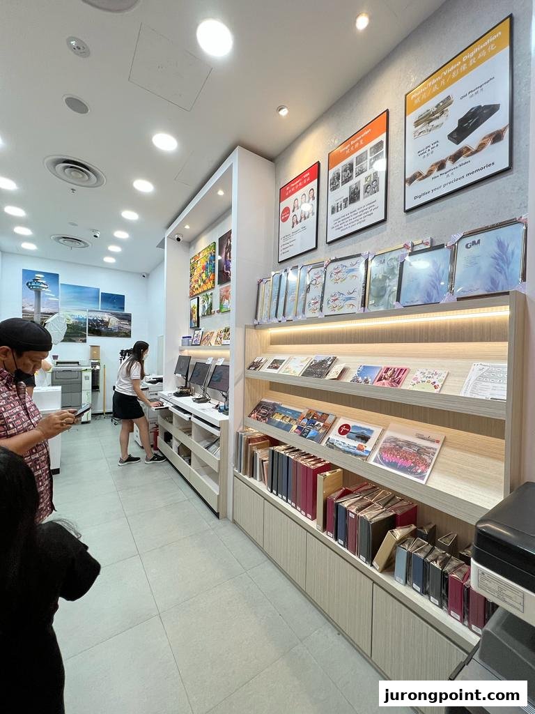 Interior view of FotoHub, showcasing photo printing services, digitization displays, and customer areas.