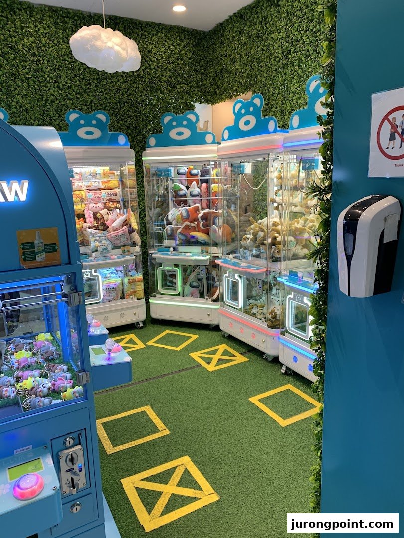 Interior view of Fun Claw, featuring multiple colorful claw machines with plush toys and prizes.